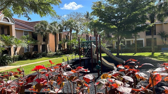 view of jungle gym featuring a yard