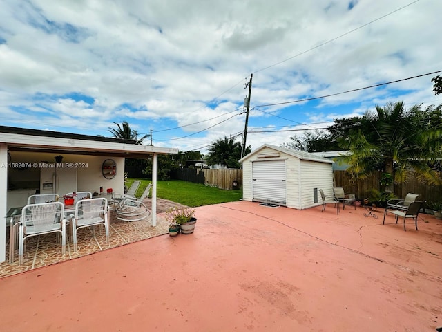 view of patio / terrace featuring a storage shed