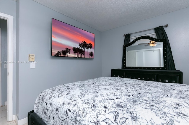 bedroom featuring a textured ceiling