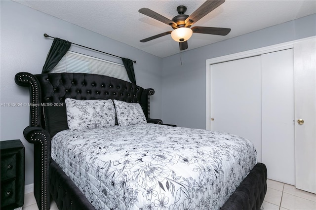 2510 SW Natura Blvd, Deerfield Beach, FL 33441 - bedroom with a closet, light tile patterned flooring, and a ceiling fan