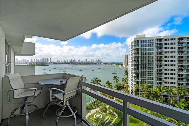 balcony featuring a water view