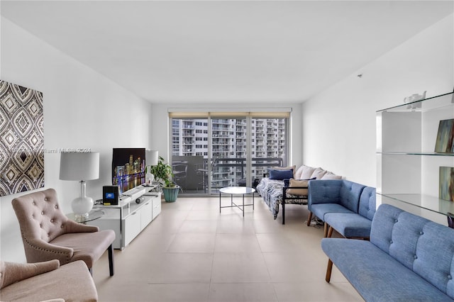 living room featuring a wall of windows