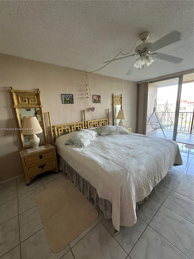 tiled bedroom featuring access to exterior, a textured ceiling, and ceiling fan