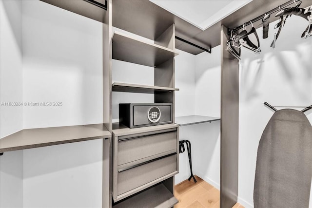 398 NE 5th St Unit 3707, Miami, FL 33132 - walk in closet with light wood-style floors