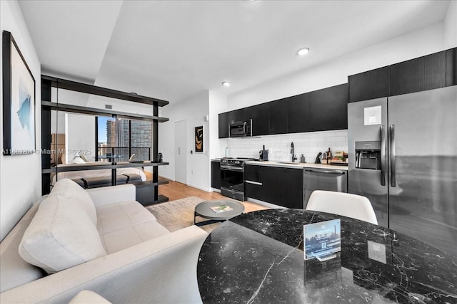 398 NE 5th St Unit 3707, Miami, FL 33132 - living area with recessed lighting and light wood-style floors