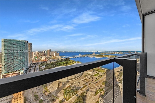 balcony featuring a water view