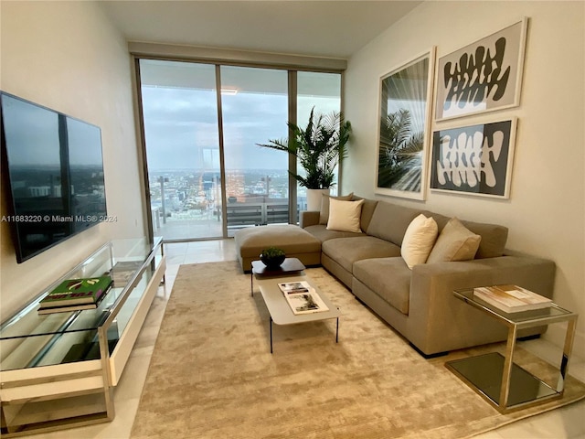 living room with expansive windows and plenty of natural light