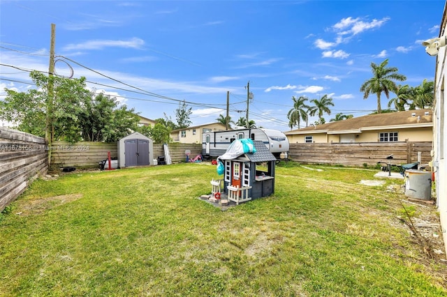 view of yard featuring a storage unit