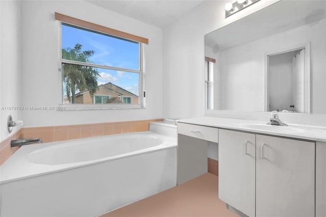 bathroom featuring vanity and a bathtub