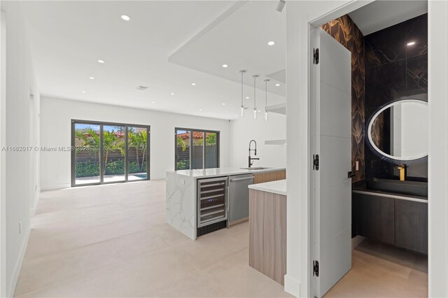 bathroom featuring vanity, tile walls, and toilet