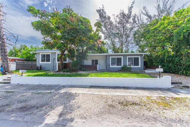11515 NE 12th Ave, Miami, FL 33161 - view of front of home featuring stucco siding