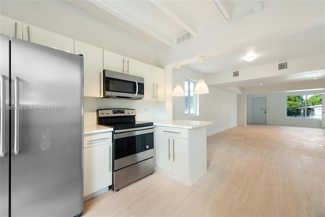 kitchen with white cabinetry, decorative light fixtures, stainless steel appliances, and kitchen peninsula