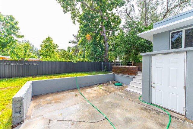 11515 NE 12th Ave, Miami, FL 33161 - fenced backyard with a patio