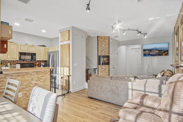 living room featuring light hardwood / wood-style flooring