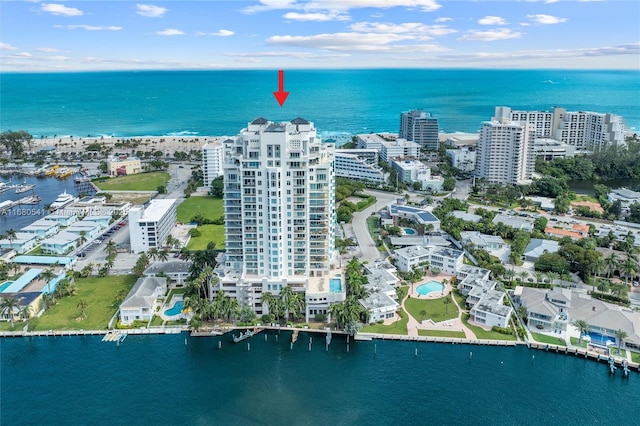 birds eye view of property featuring a water view