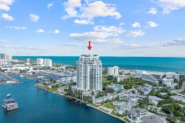 birds eye view of property featuring a water view