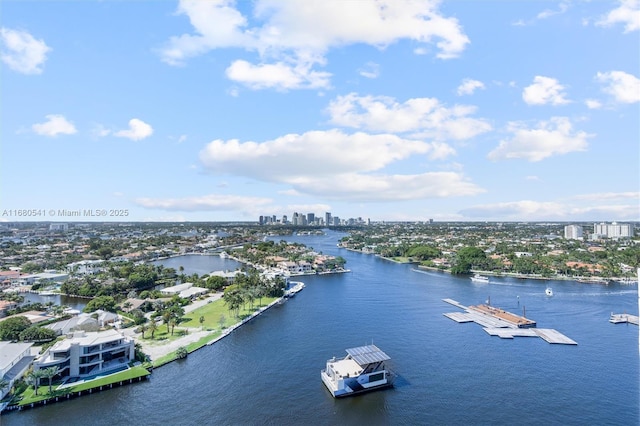 birds eye view of property featuring a water view