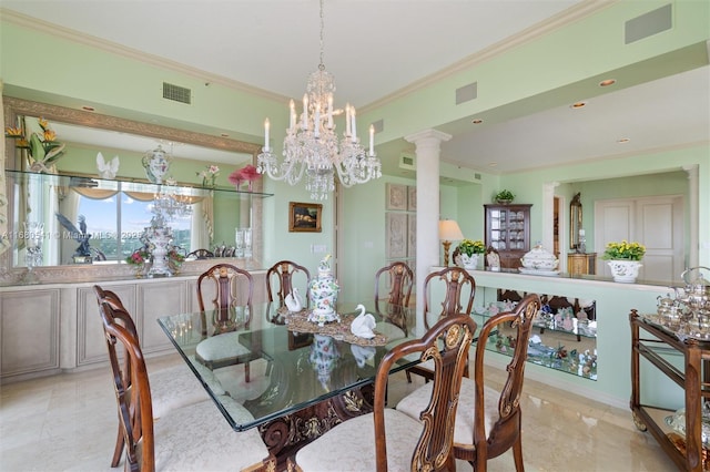 dining room featuring an inviting chandelier, ornamental molding, and decorative columns