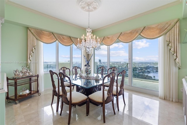 dining space with a water view, crown molding, and an inviting chandelier