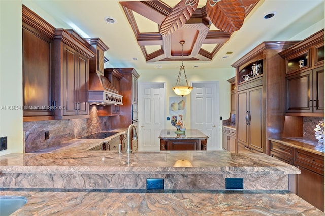 kitchen with decorative backsplash, black electric stovetop, light stone countertops, ornamental molding, and pendant lighting