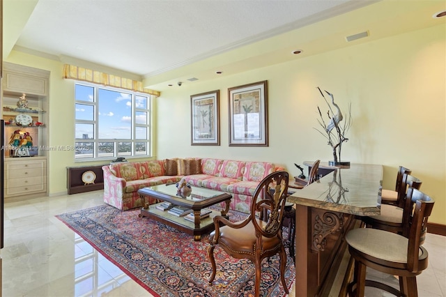 living room featuring ornamental molding