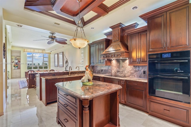 kitchen featuring custom range hood, black appliances, coffered ceiling, a kitchen island, and sink