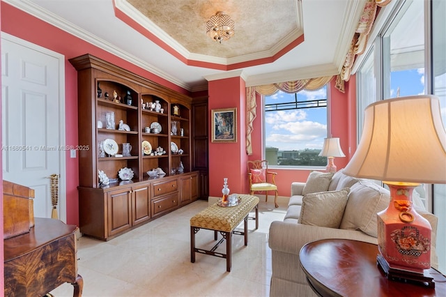 living area with a raised ceiling, light tile patterned floors, and crown molding