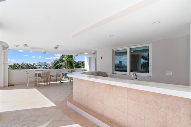 view of patio featuring exterior bar