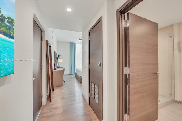 hall featuring light hardwood / wood-style floors