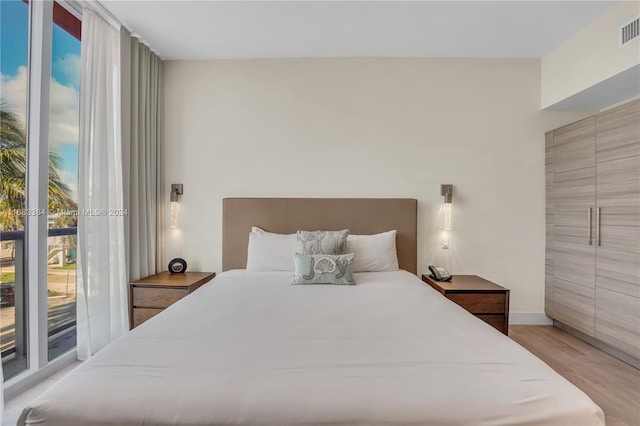 bedroom featuring light hardwood / wood-style flooring