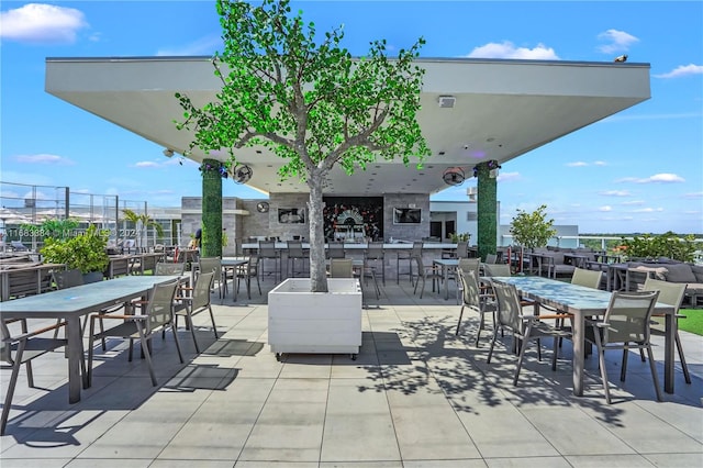 view of patio with a bar