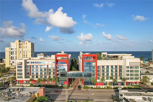 view of building exterior with a water view