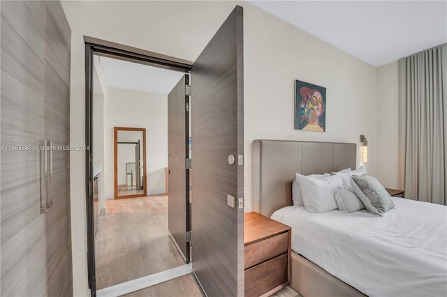 bedroom featuring hardwood / wood-style flooring