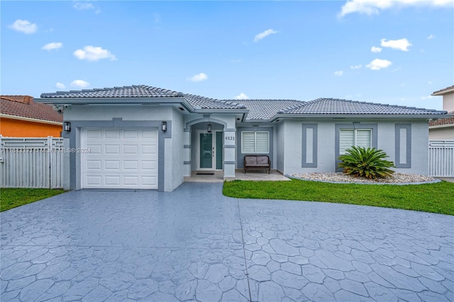 view of front of home with a garage