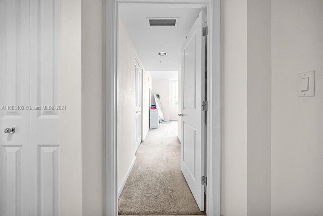 610 W Las Olas Blvd Unit 312N, Fort Lauderdale, FL 33312 - hallway with light carpet and baseboards