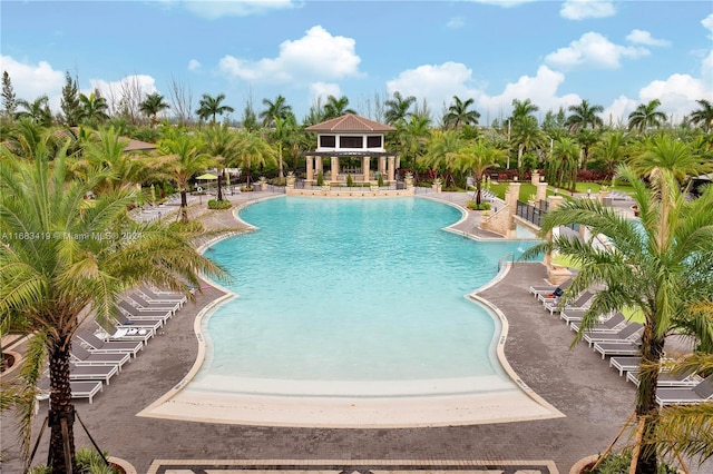 view of swimming pool with a patio area