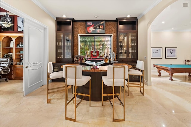 bar with crown molding and pool table