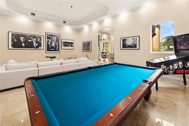 recreation room featuring arched walkways, billiards, a tray ceiling, visible vents, and ornamental molding