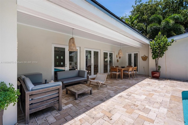 view of patio with french doors and an outdoor hangout area