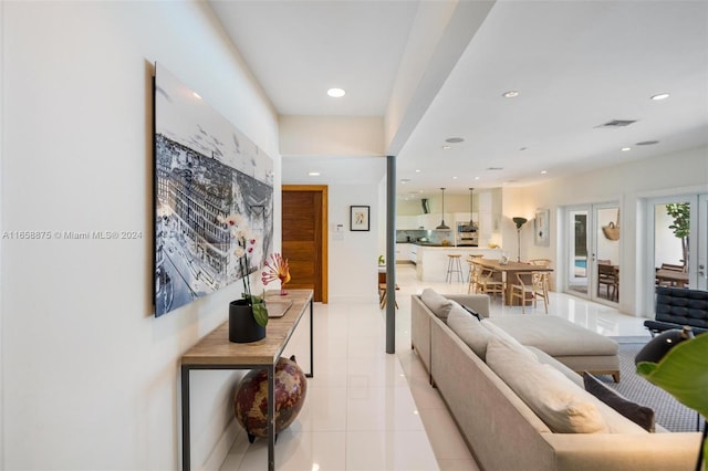 living room with light tile patterned floors