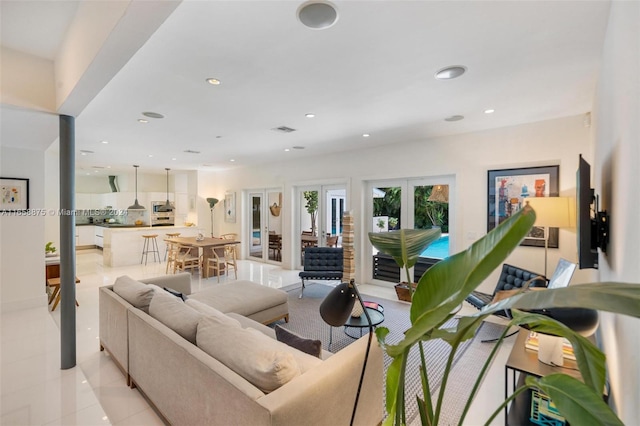 tiled living room with french doors