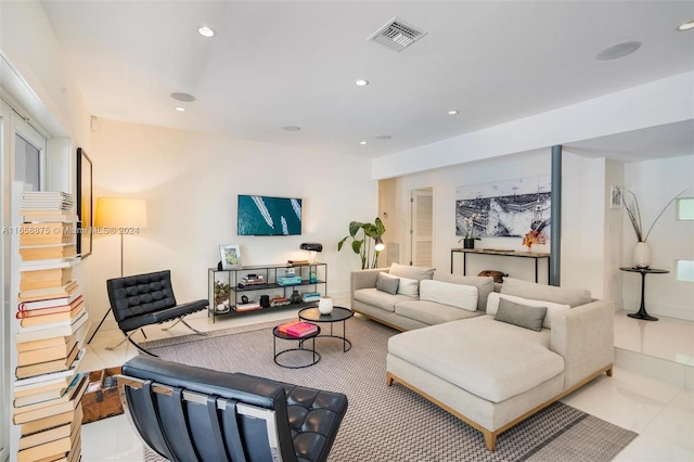 living room with light tile patterned flooring