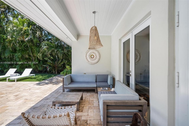 view of patio featuring outdoor lounge area and french doors