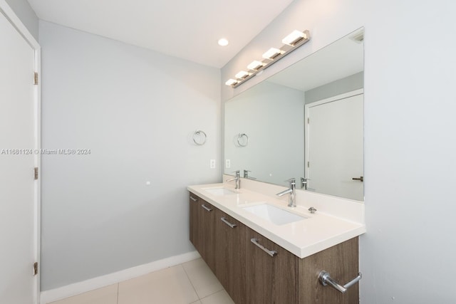 bathroom with vanity and tile patterned flooring