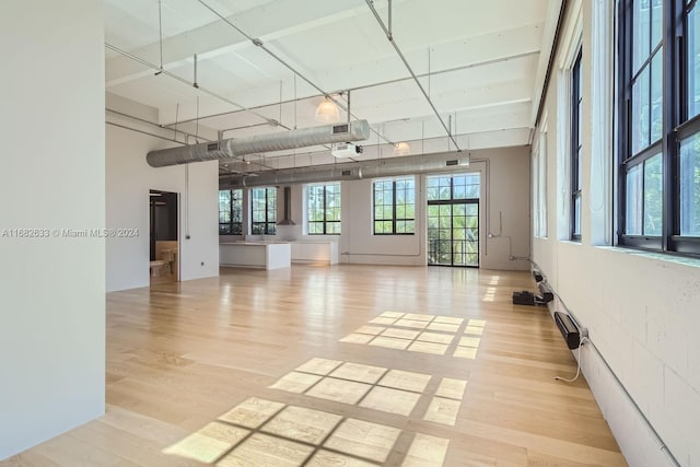 spare room featuring light hardwood / wood-style flooring