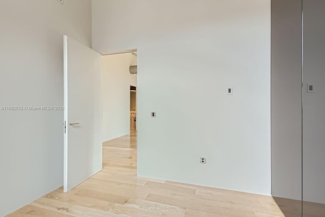 unfurnished room featuring light hardwood / wood-style floors