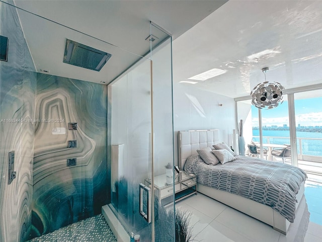 2020 N Bayshore Dr Unit 2007, Miami, FL 33137 - tiled bedroom featuring a water view and floor to ceiling windows