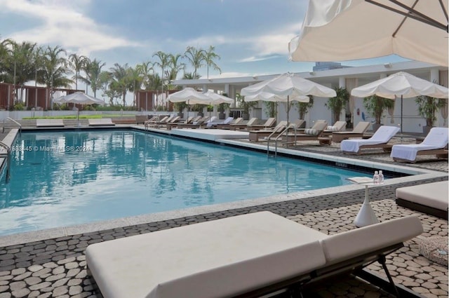 view of swimming pool featuring a patio