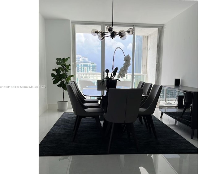 dining room with light tile patterned flooring, floor to ceiling windows, a healthy amount of sunlight, and a notable chandelier