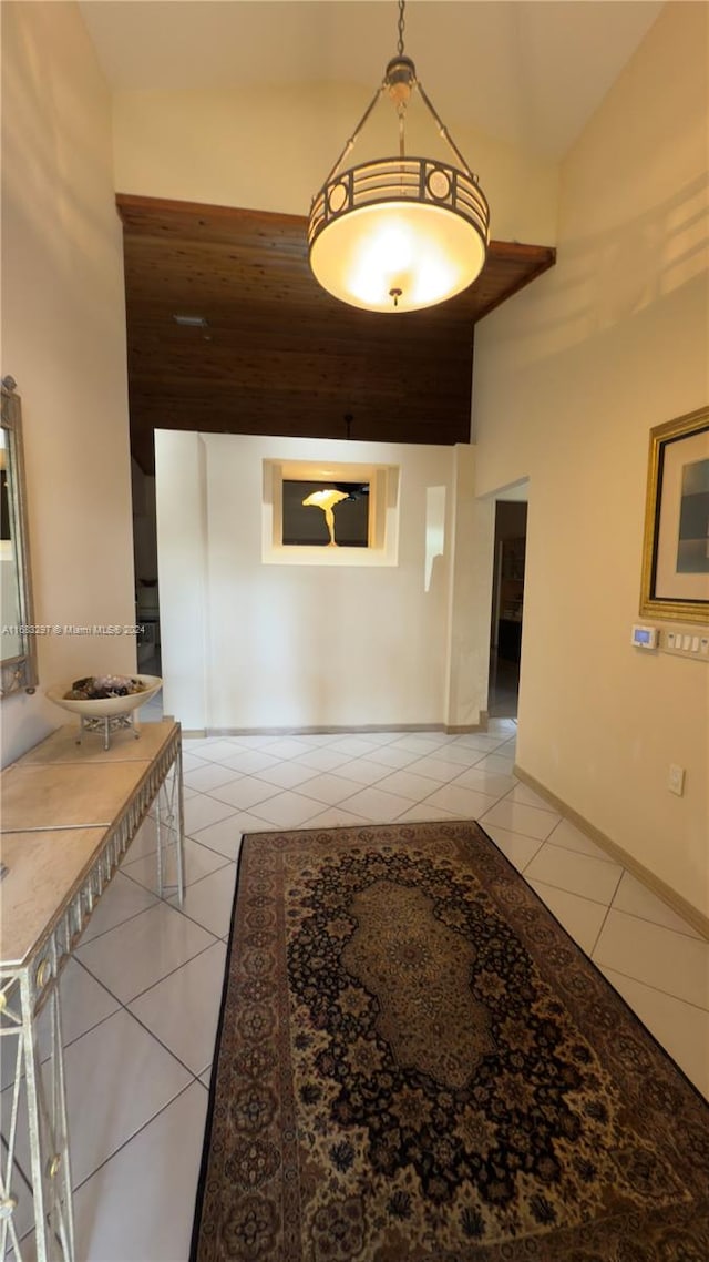 hallway with light tile patterned flooring